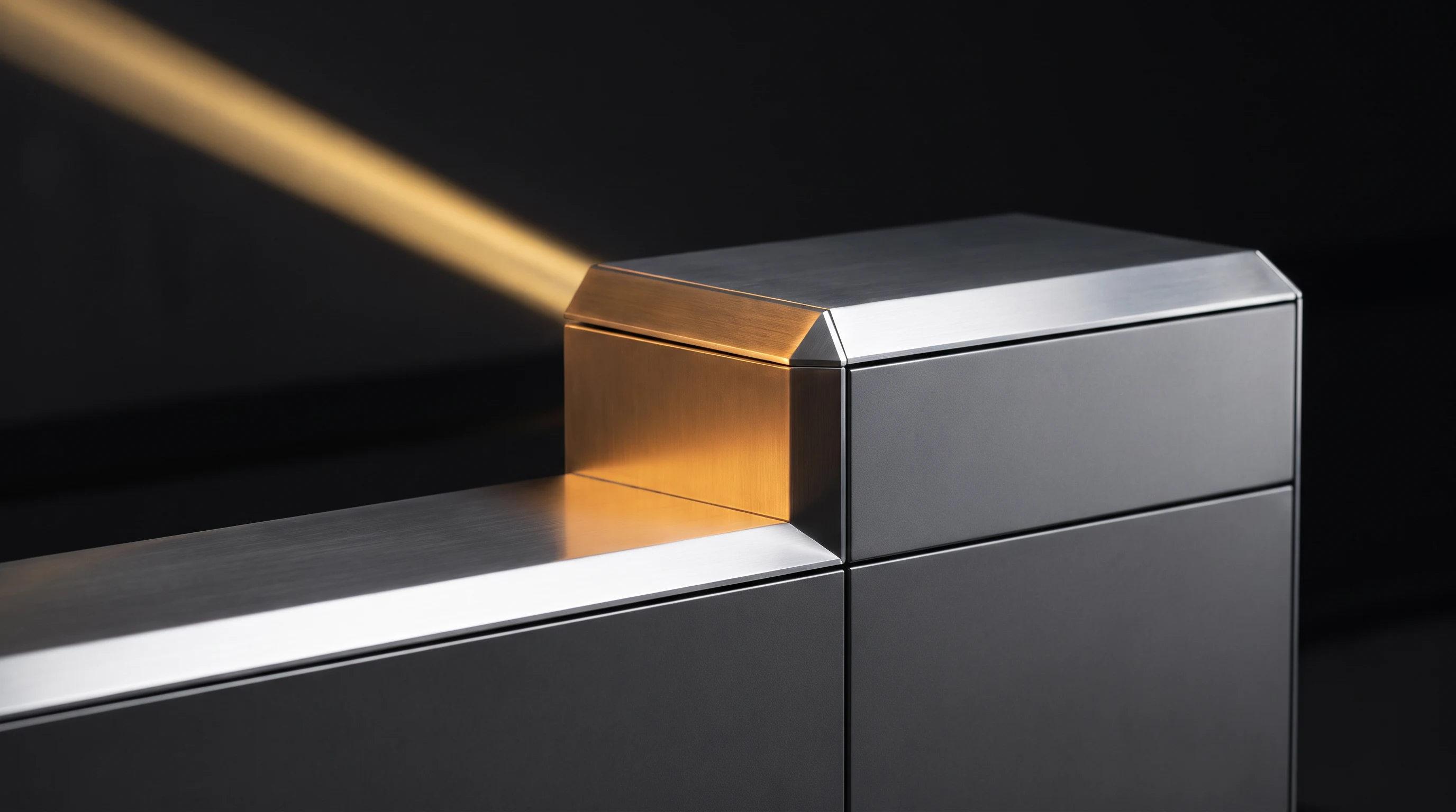 Sleek brushed-metal display fixture with crisp architectural edges and a precise beam of gold light, representing precision POS production